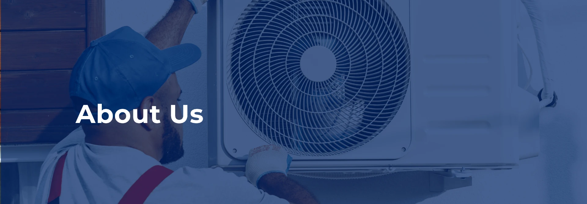 A technician in a blue cap services a wall-mounted AC, with 